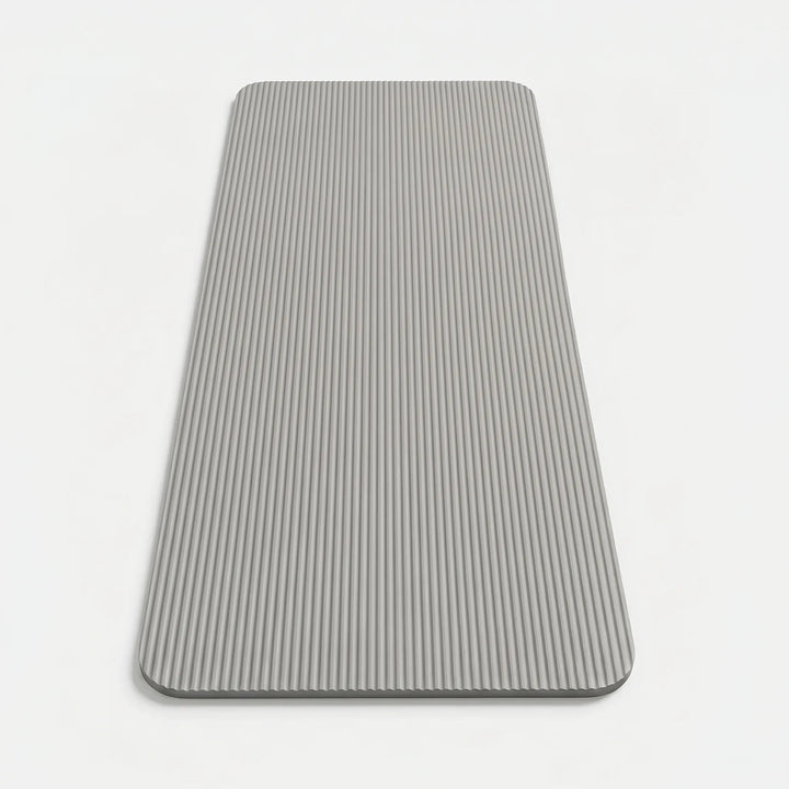 Unisex fitness mat for yoga, pilates, and home workouts, designed for ultimate comfort & stability.