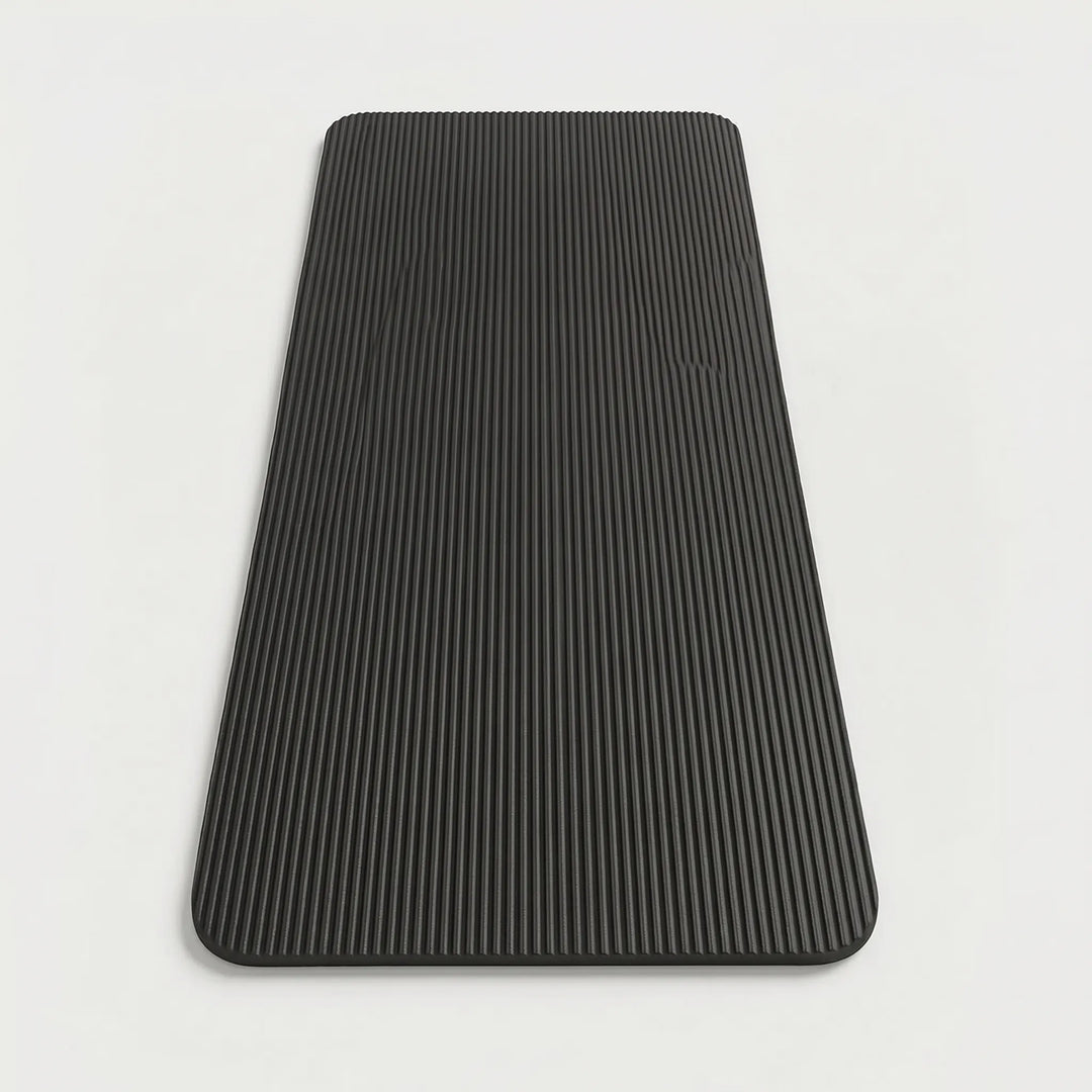 High-density thick yoga & pilates mat, providing superior comfort for unisex home workouts & exercise.