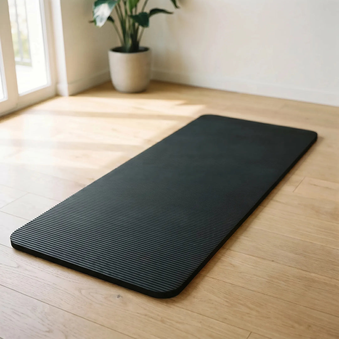 Thick unisex home exercise mat for yoga & pilates, non-slip for safe workouts & fitness.