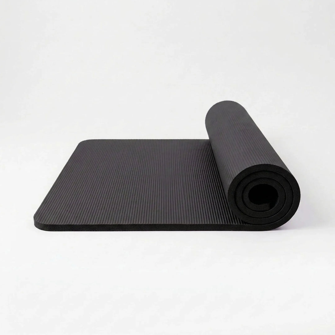 Unisex yoga mat for home workouts. Thick, non-slip pilates & fitness mat for comfortable exercise.