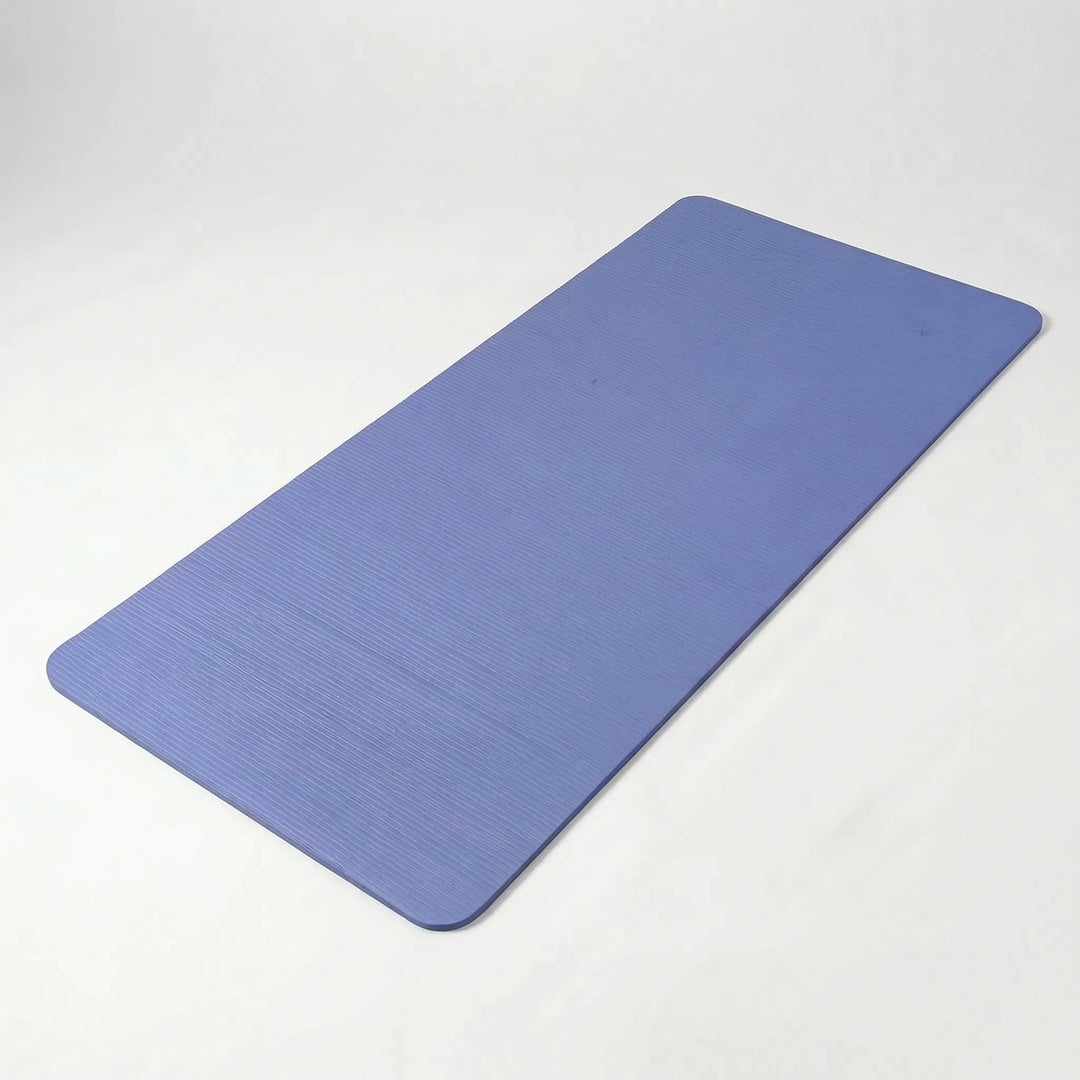 Premium thick home exercise mat. Non-slip design ideal for yoga, pilates, & various fitness workouts.