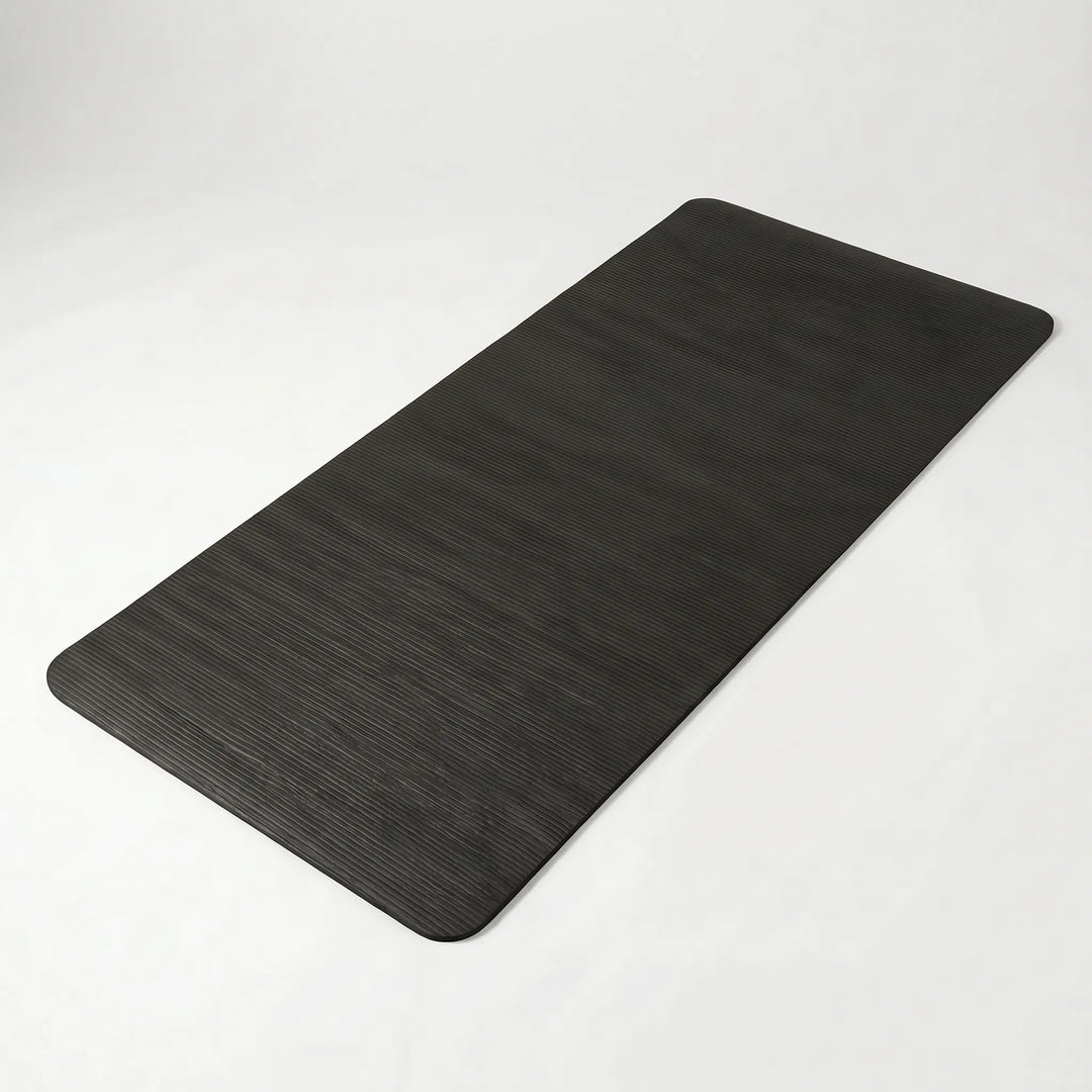 Versatile thick home fitness mat for yoga, pilates, & floor exercises. Non-slip & durable workout gear.