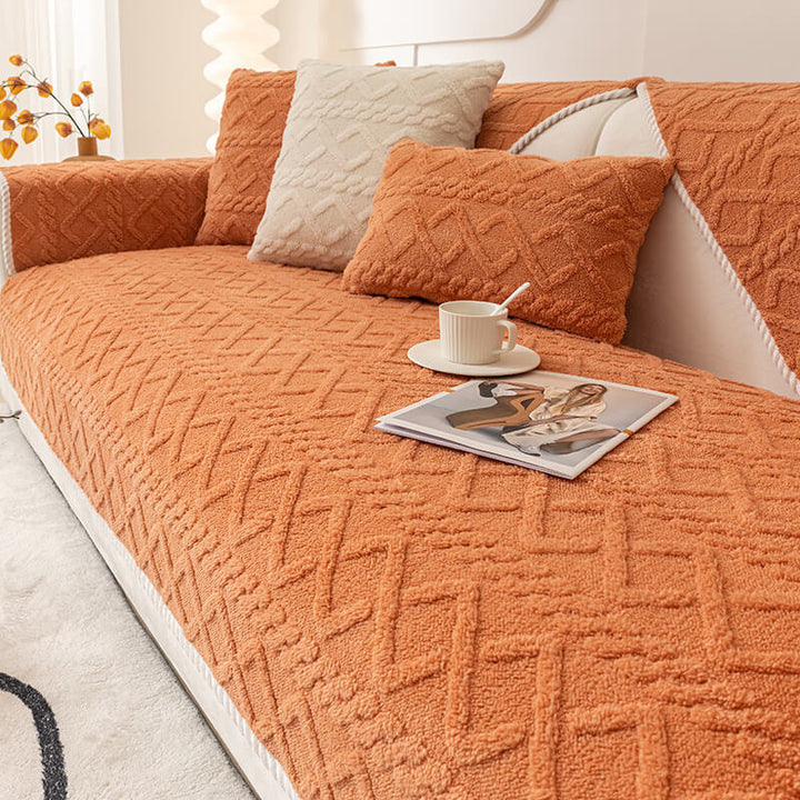 Detailed view of the non-slip backing on the thickened plush sofa cover, ensuring it stays in place.