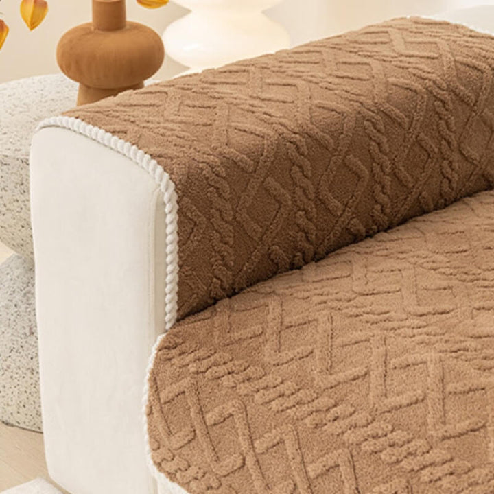 Close-up of the plush texture of the pet-friendly sofa cover, highlighting its cozy thickened material.