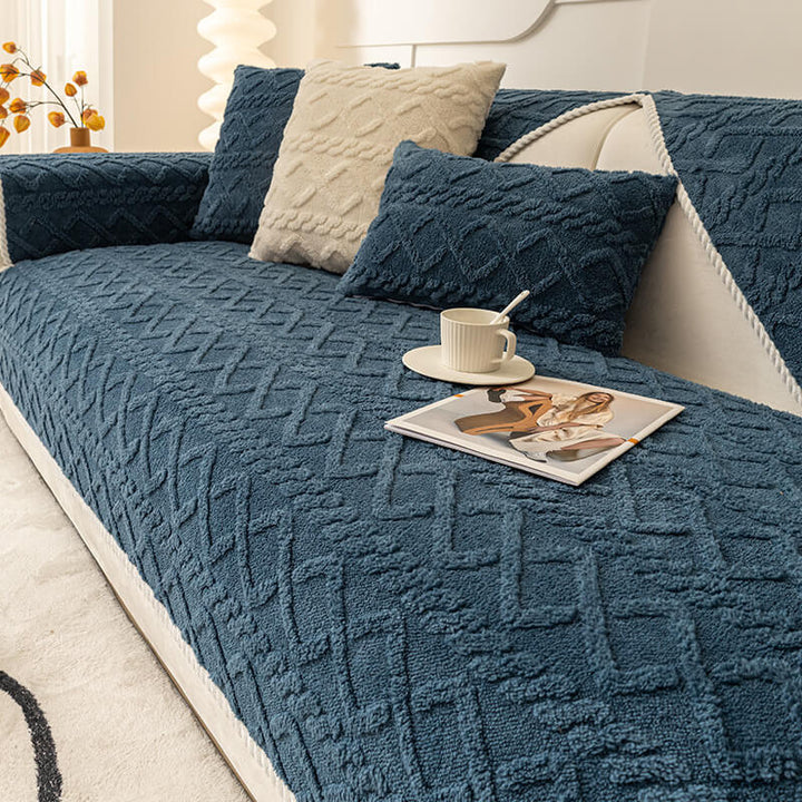 Cozy thickened plush couch cover in a living room setting, designed for pet owners, machine washable.
