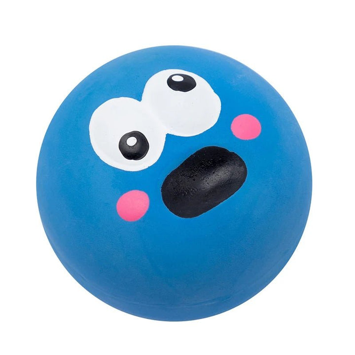 Close-up of a tough, textured squeaky dog ball, ideal for strong chewers.