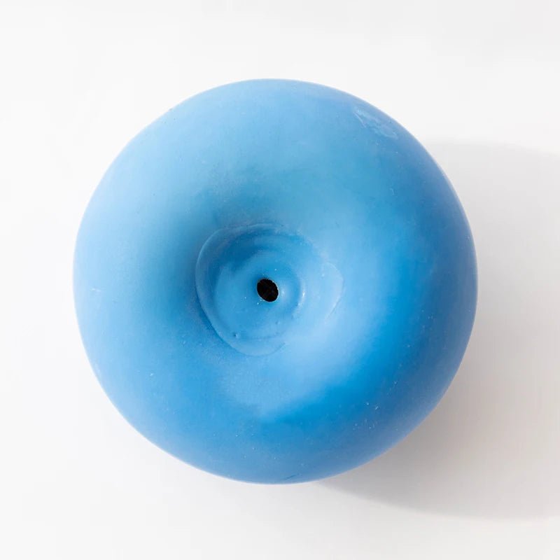 Assorted durable dog chew balls with squeakers, perfect pet supplies for active dogs.