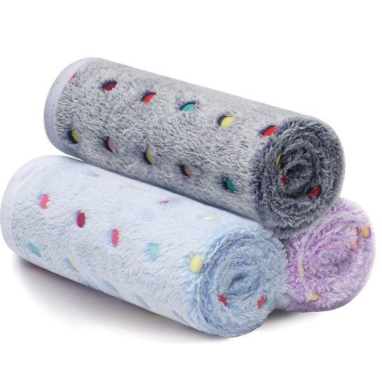 Coral fleece pet blanket set (3-pack) in assorted colors, a soft and cozy accessory for animal bedding or home decor.