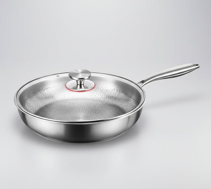 High-quality titanium non-stick skillet with hammered design. Induction ready frying pan for superior cooking.