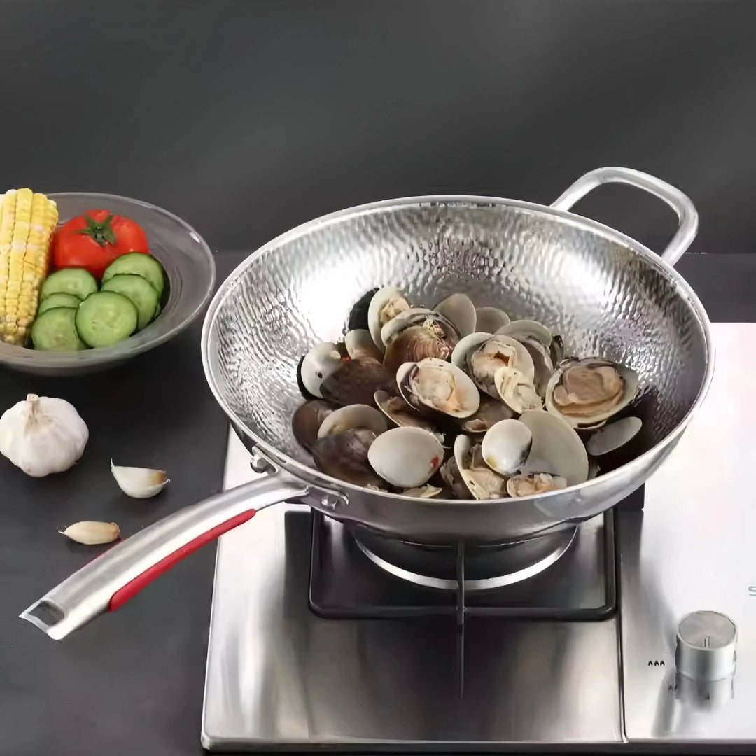 Titanium round bottom wok, induction ready for stir-frying. Durable, lightweight nonstick kitchen cookware.