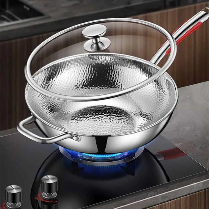 Chef's titanium stir-fry wok with round bottom, induction ready. Nonstick, durable kitchen cookware for cooking.