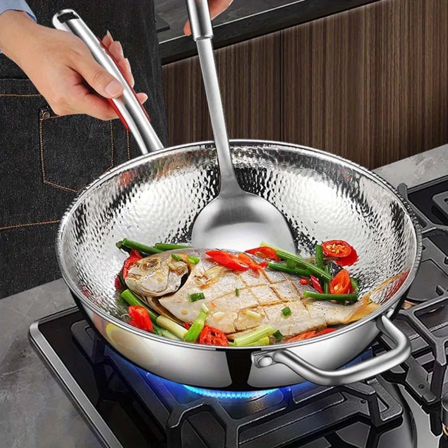Induction-ready titanium wok with round bottom. Lightweight, nonstick, durable cookware for healthy stir-fries.