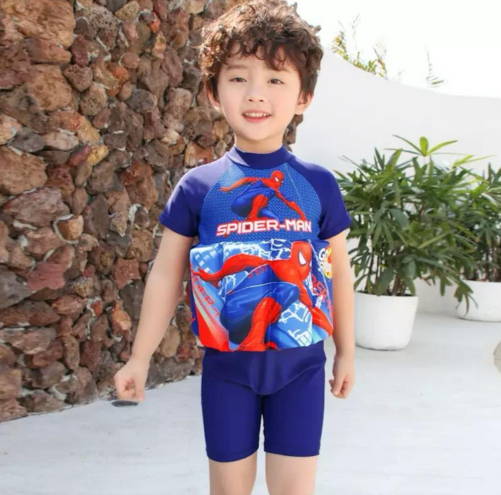 Kids' SPF 50+ swim vest with shorts, ensuring sun safety & floatation.