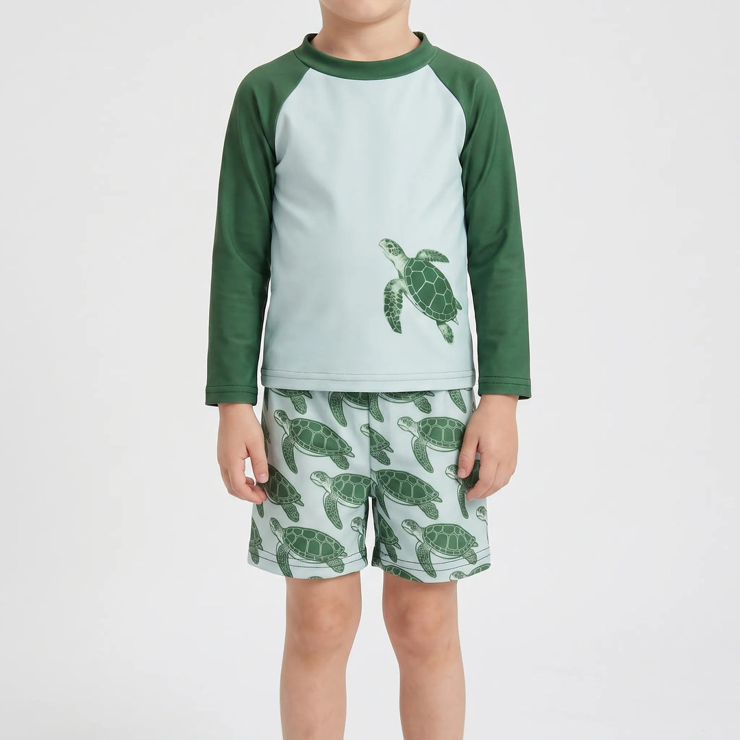 Kids long-sleeve rash guard swimsuit for toddlers. Tortoise print beachwear for sun protection & water play.