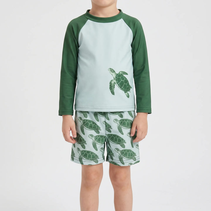 Kids long-sleeve rash guard swimsuit for toddlers. Tortoise print beachwear for sun protection & water play.