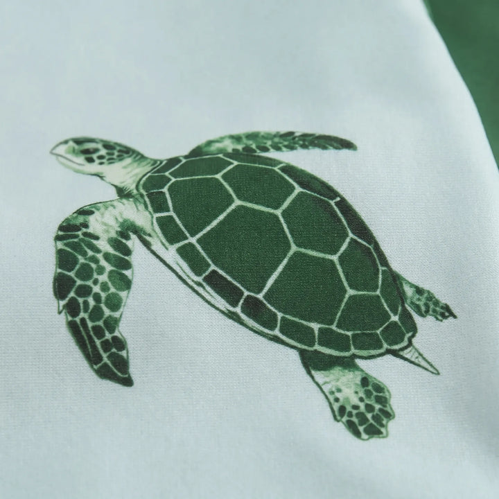 Children's long-sleeve tortoise print swimwear set. Perfect toddler rash guard for summer fun & pool wear.