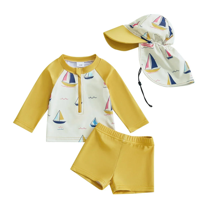 Comfortable toddler sun protection swim set: blue long-sleeve rash guard, elastic shorts, and adjustable swim hat.