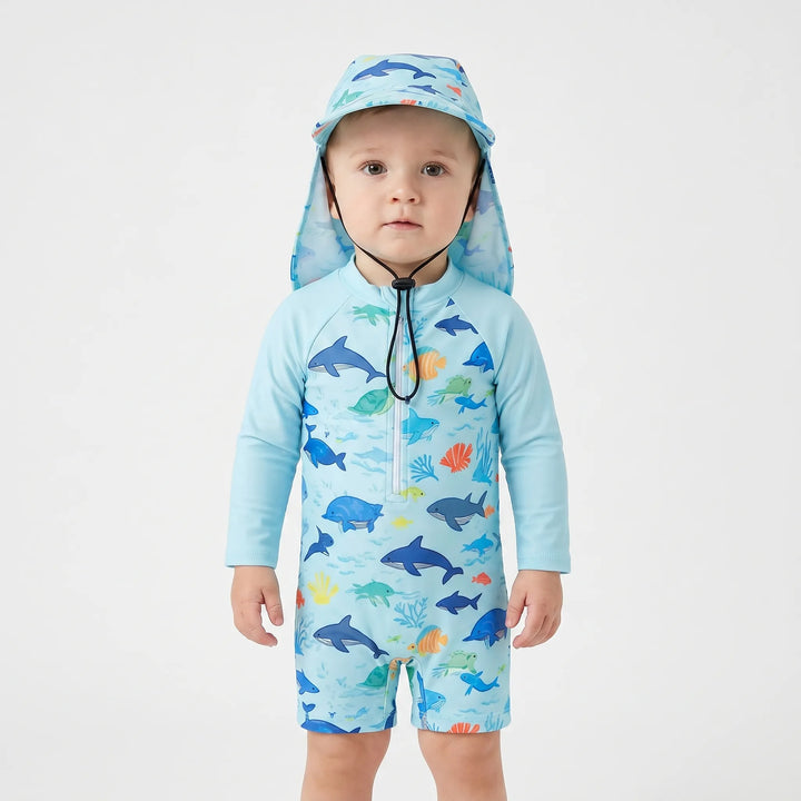 Baby long-sleeve swim romper and hat set, blue ocean print, offering UV sun protection for pool days.