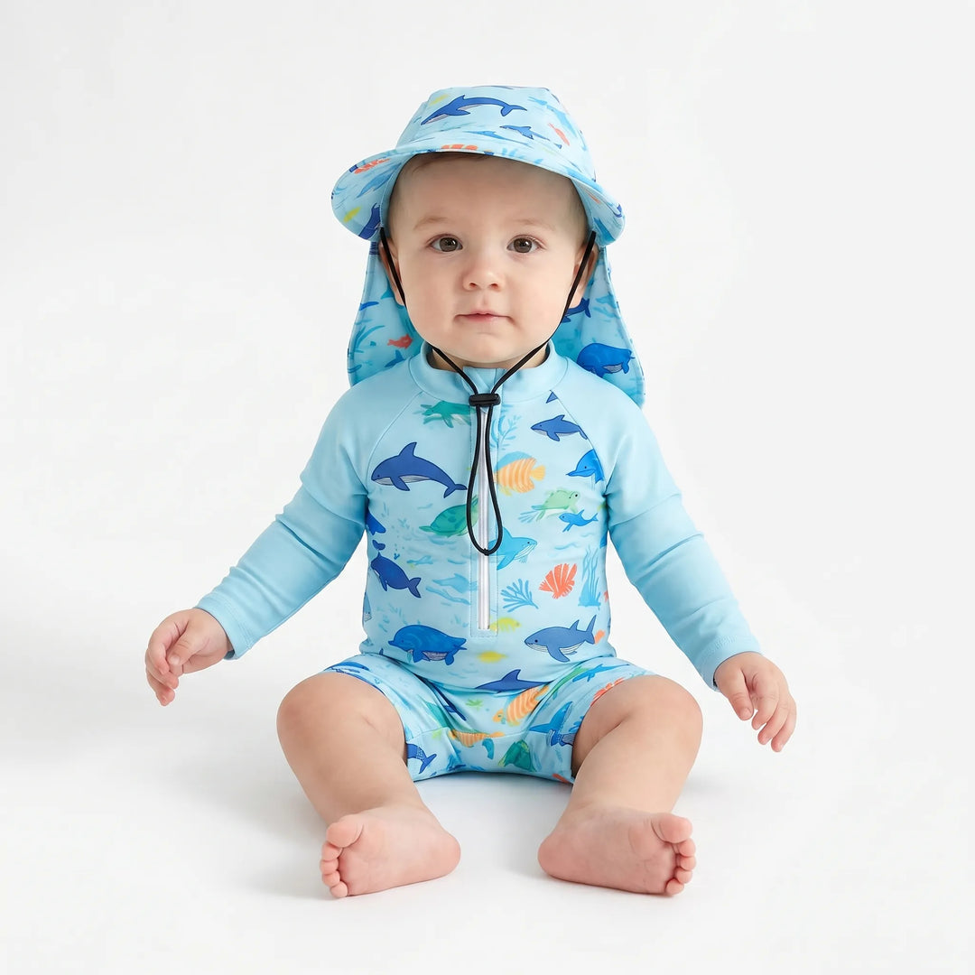 Ocean print long-sleeve swim romper & matching hat for toddlers. Unisex design, great for sun protection.