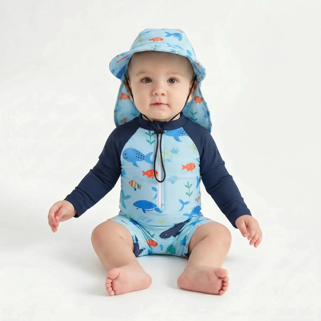 Unisex toddler long-sleeve swim romper & hat set with vibrant ocean print for ultimate sun protection.