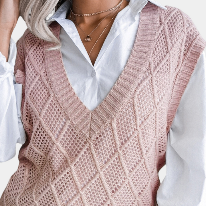 Comfortable women's knitted sweater, a trendy and versatile pullover designed for stylish autumn outfits.