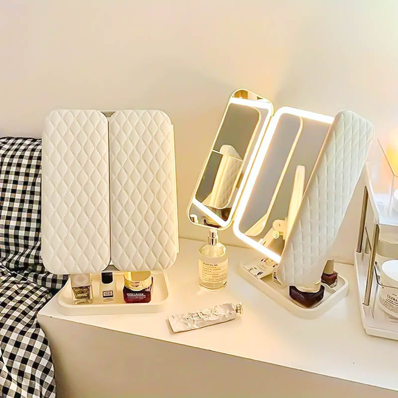 Trifold LED vanity mirror with adjustable lighting for perfect makeup application. Ideal beauty tool.