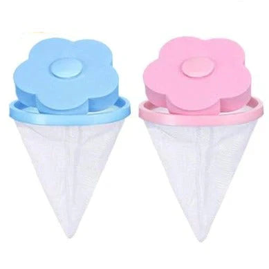 Hand holding a reusable floating lint and hair catcher, showing its compact design