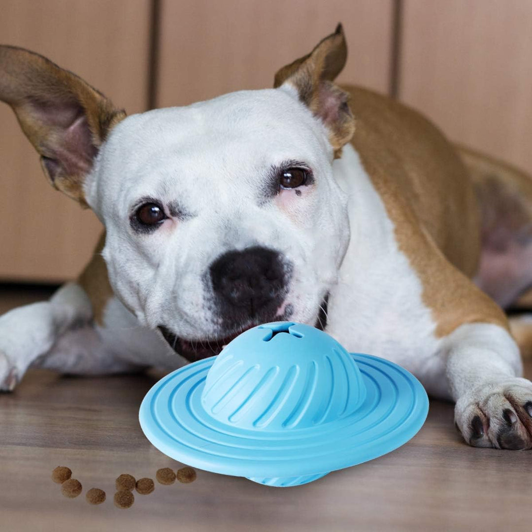 Side view of UFO dog enrichment toy with treats, encouraging interactive play