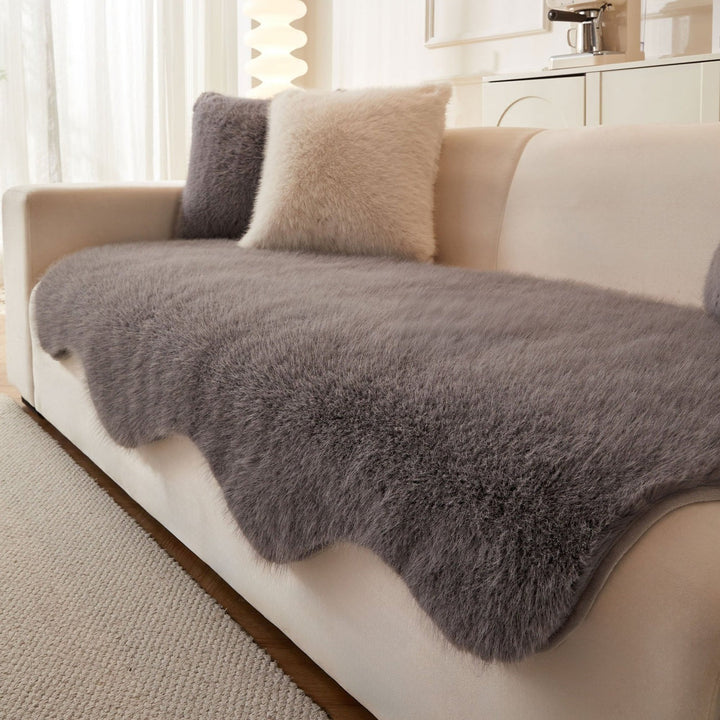 Living room sofa cover, ultra-soft Scandinavian design in pet-friendly microfiber.