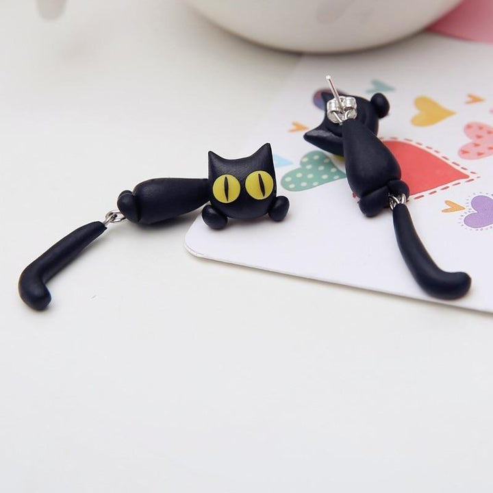 Unisex black and white cat paw socks, super soft and comfortable for ultimate relaxation.