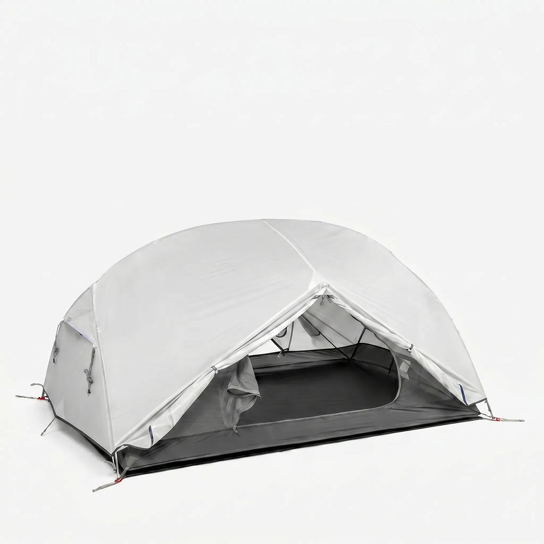 Lightweight 1-3 person backpacking tent pitched in nature. Perfect 3 season outdoor shelter for hiking trips.