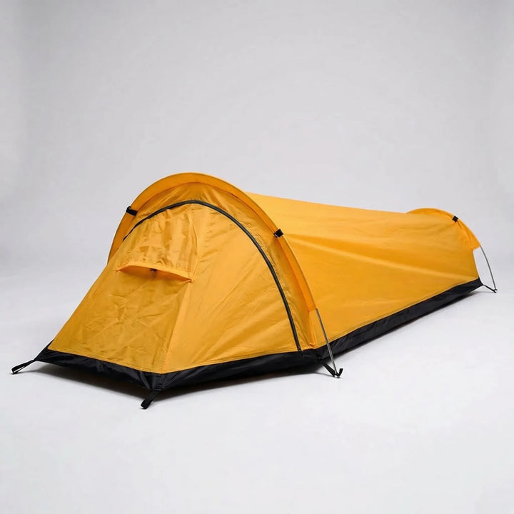 Unisex ultralight 1-person backpacking bivy tent in a natural setting, perfect for solo wilderness camping.