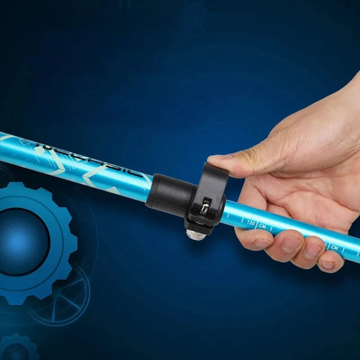 Close-up of the grip and strap on an ultralight 5-section folding trekking pole for hiking.