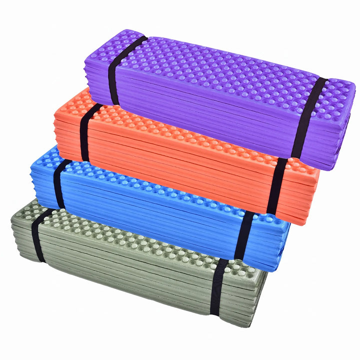 Portable blue camping mat, an essential ultralight sleeping pad for hiking. Foldable closed-cell foam camp gear.