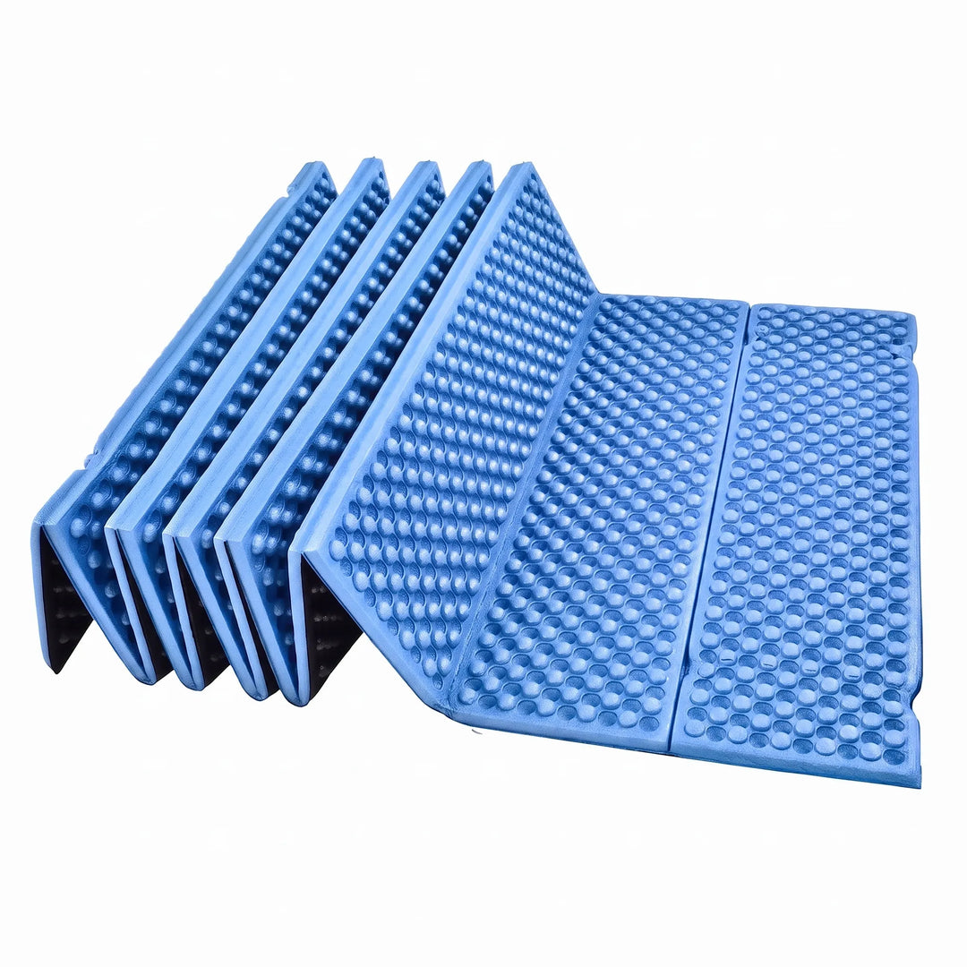 Unisex ultralight blue sleeping pad for camping and hiking. Foldable closed-cell foam mat, ideal for outdoor use.