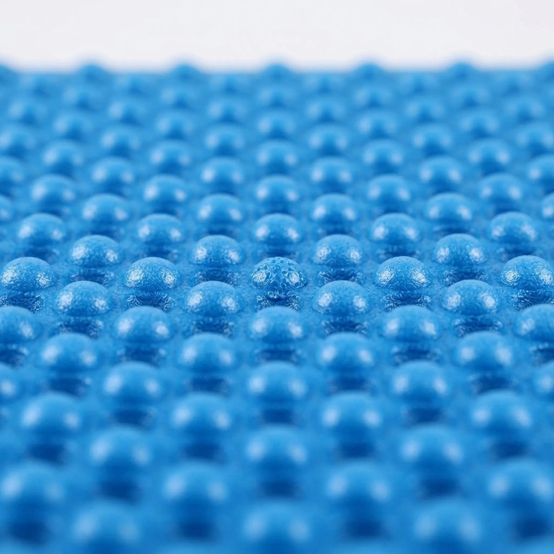 Foldable blue closed-cell foam sleeping pad, ultralight for camping & hiking. Insulating outdoor mat.