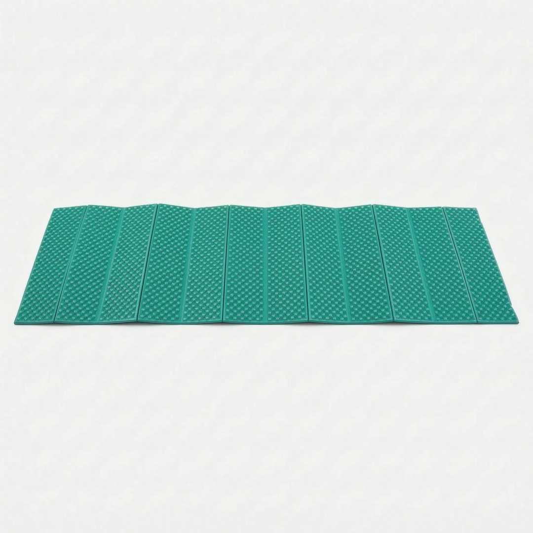 Unfolded blue closed-cell foam sleeping pad. Ultralight camping mat texture for comfortable outdoor sleeping & hiking.