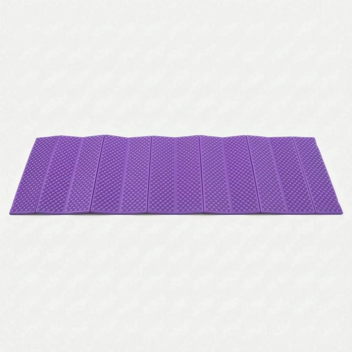 Durable blue ultralight camping mat. Foldable closed-cell sleeping pad for comfortable outdoor recreation & hiking trips.