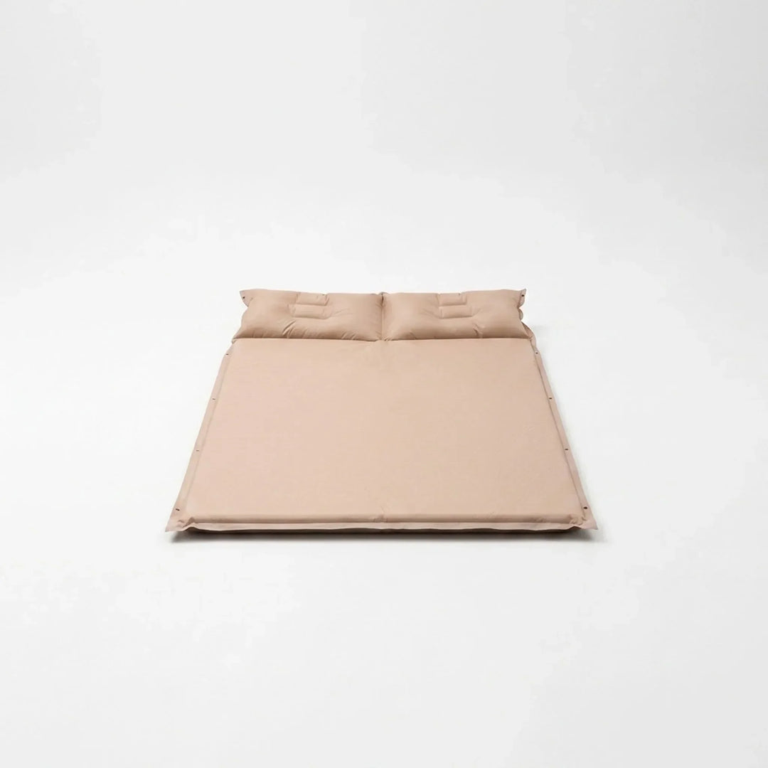 Self-inflating camping sleeping pad, ultralight for outdoor hiking comfort. Essential travel gear for adventurers.