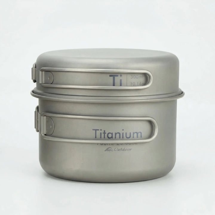 Folding ultralight camp pot and pan set, compact backpacking gear for easy transport and outdoor meals.