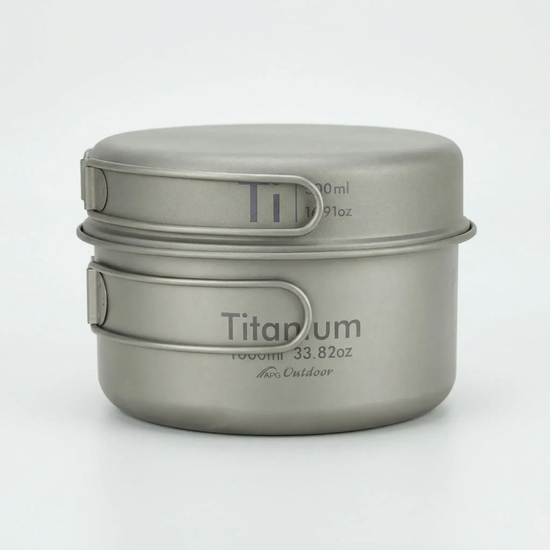 Complete ultralight titanium camping pot and pan set for backpackers, essential outdoor cooking gear.