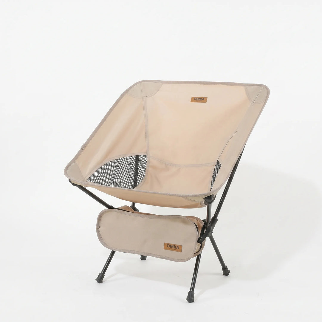 Compact folding camping chair with durable aluminum frame, breathable mesh, and oxford cloth seat for hiking and travel.