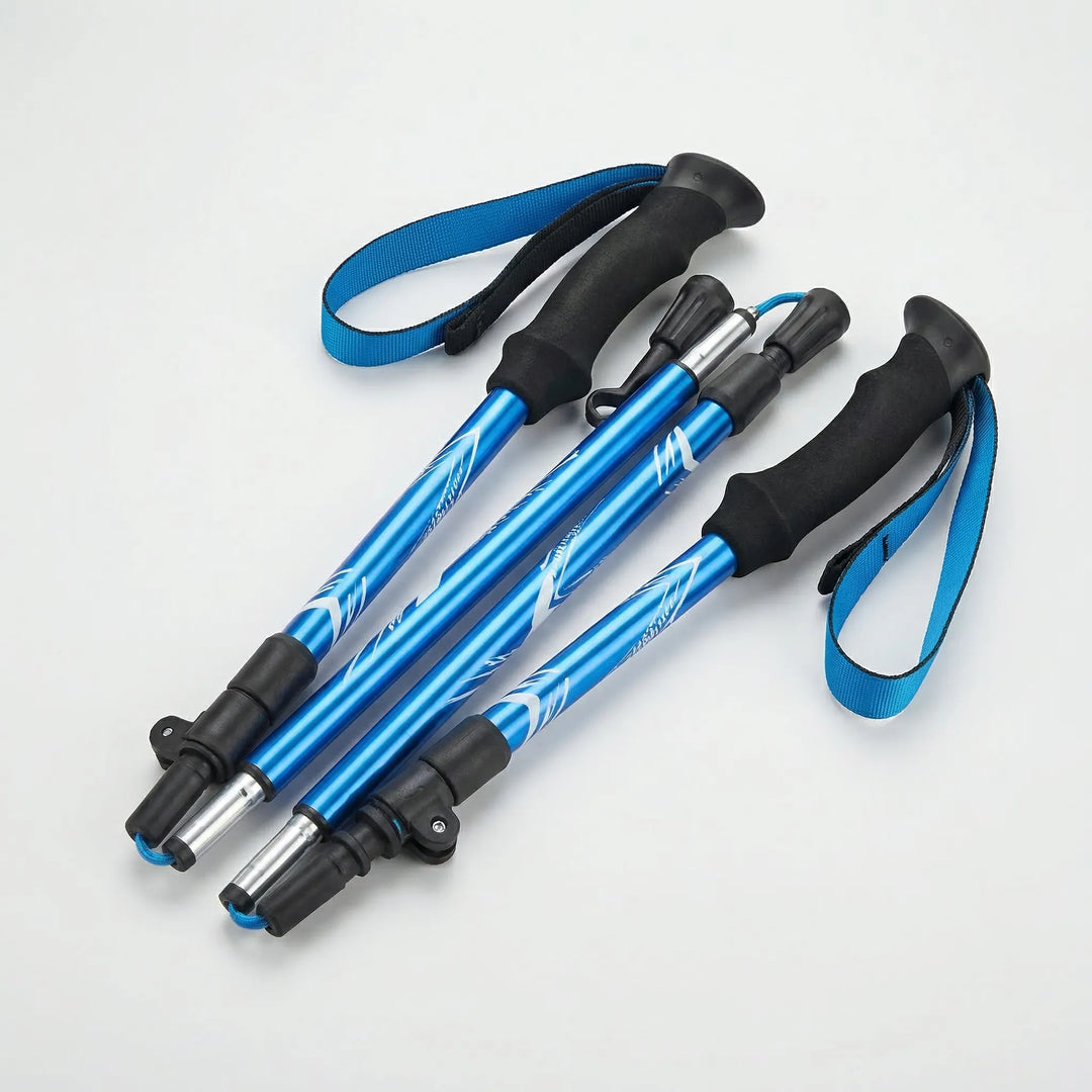 Aluminum ultralight trekking poles, folding and adjustable for versatile use in hiking & trail walking.