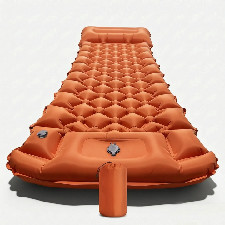 Durable camping mattress with built-in pillow & foot pump. Ultralight, portable camp gear for adventure travel.