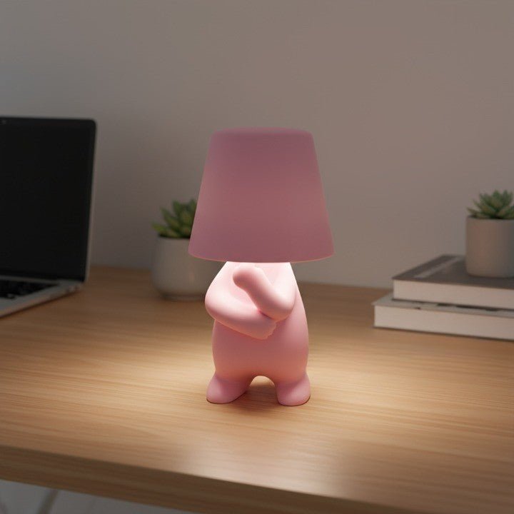 Modern human shape LED desk lamp, an artistic table light for contemporary room decor. Provides ambient lighting.