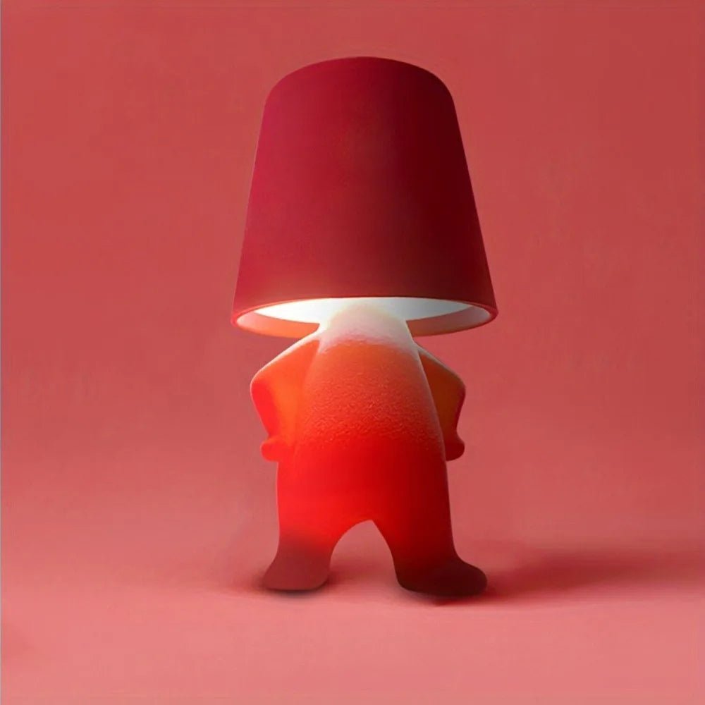 Unique human shape LED desk lamp. Modern artistic rechargeable table light for contemporary decor & creative workspaces.