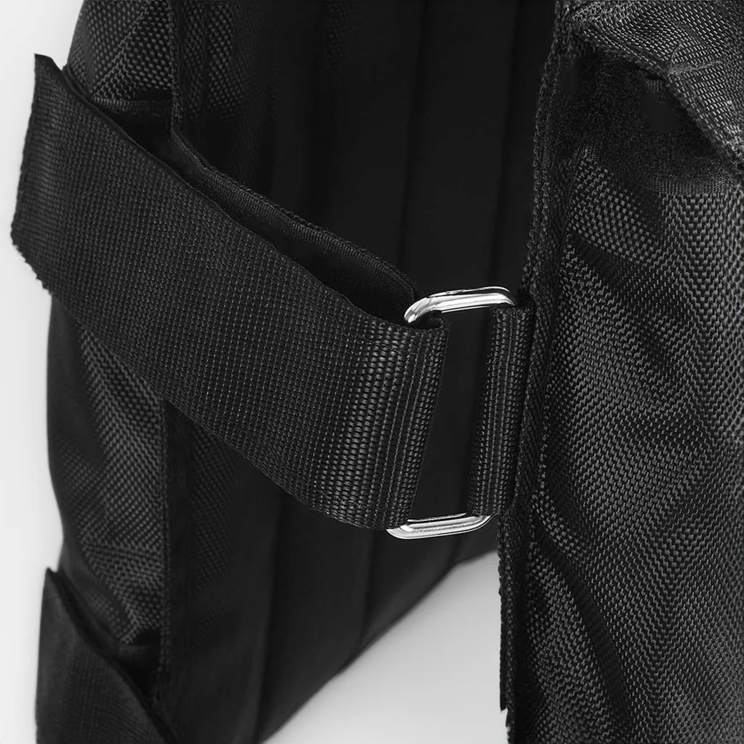 Close-up of an adjustable 110 lb weighted vest, showcasing removable weights for customizable strength training.