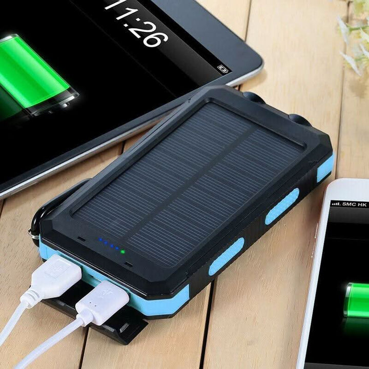 Portable 20000mAh solar charger, waterproof power bank for outdoor enthusiasts, includes emergency LED light.