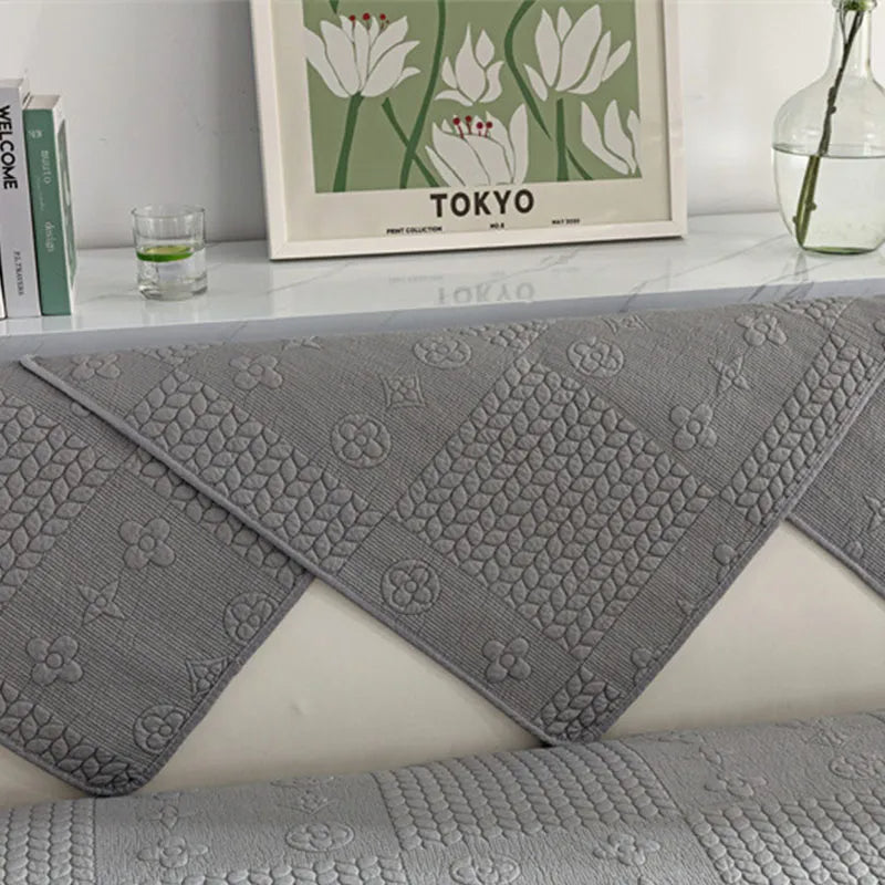 Washable couch cover with intricate 3D wheat embroidery, offering pet-friendly furniture protection
