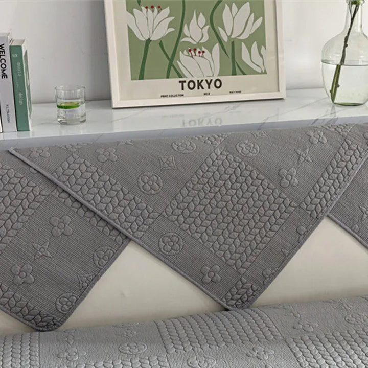 Washable couch cover with intricate 3D wheat embroidery, offering pet-friendly furniture protection